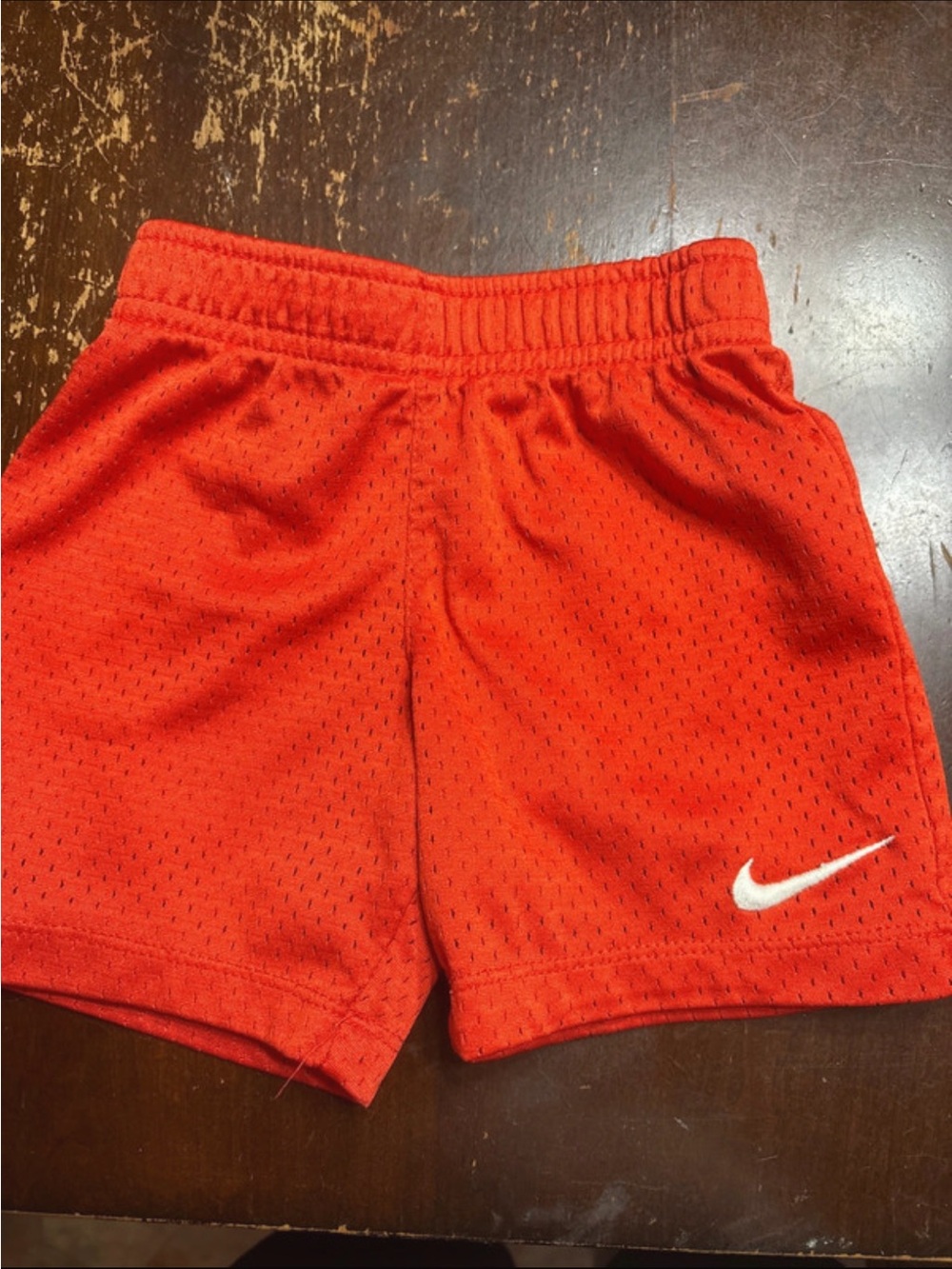 Nike Kids Bright Red Mesh Athletic Shorts with White Swoosh